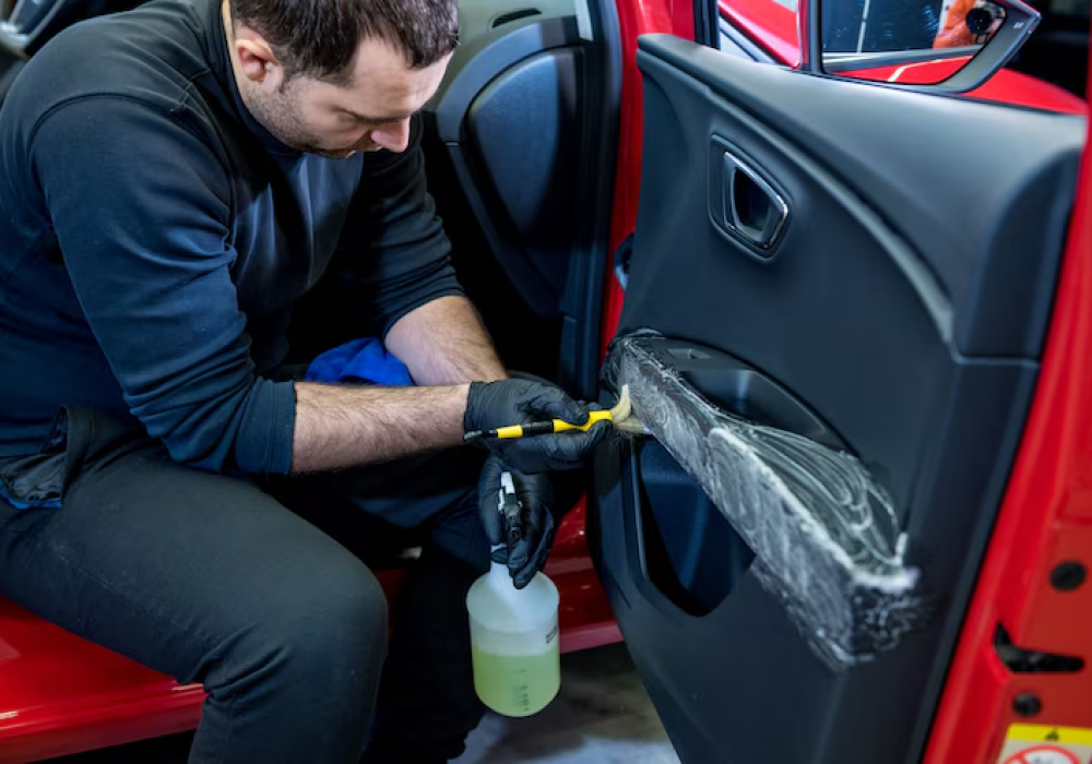 imgi_46_car-service-worker-cleans-interiror-with-special-brush_179755-11127